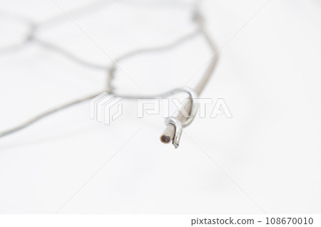Wire mesh cage with on the white background Wire mesh cage with on the white background 108670010
