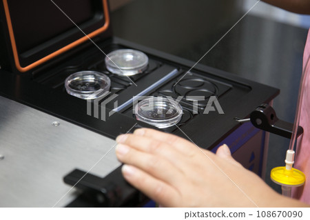 Closeup of lab equipment for scientific research with fluids Closeup of lab equipment for scientific research with fluids 108670090