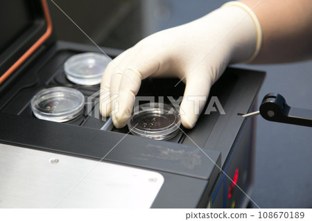 Closeup of lab equipment for scientific research with fluids Closeup of lab equipment for scientific research with fluids 108670189