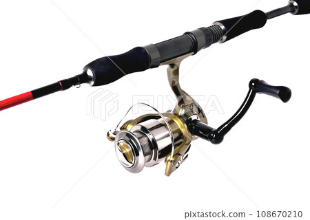 fishing reel on a fishing rod, white background close-up 108670210