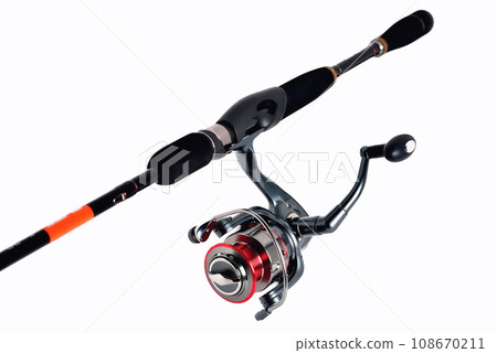 fishing reel on a fishing rod, white background close-up 108670211