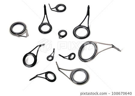 crossing rings for fishing rods of different sizes close-up space for an inscription 108670640