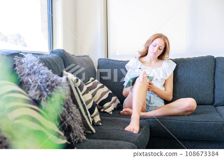 White woman writing in a notebook Digital detox 108673384