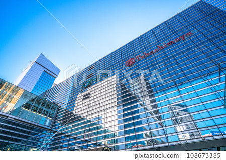 Yokohama cityscape in Japan November - Yokohama Takashimaya, Yokohama Station and JR Yokohama Tower reflected in the window glass. Yokohama cityscape in Japan November - Yokohama Takashimaya, Yokohama Station and JR Yokohama Tower reflected in the window glass. 108673385