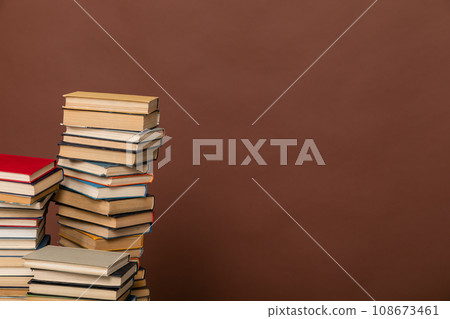 learning literacy science education stack of books on a brown background learning literacy science education stack of books on a brown background 108673461