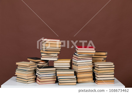 learning literacy science education stack of books on a brown background learning literacy science education stack of books on a brown background 108673462