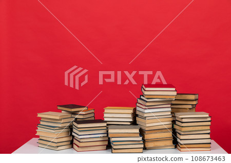 learning literacy science education stack of books on a green background learning literacy science education stack of books on a green background 108673463