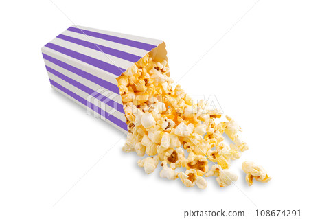 Tasty cheese popcorn falling out of a purple striped carton bucket, isolated on white background 108674291