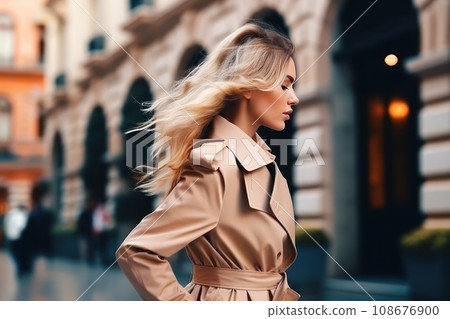 Stylish and Fashionable A Young Woman in a Trench Coat 108676900