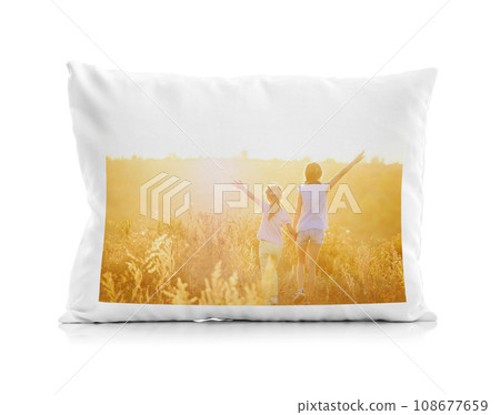 Close-up of white pillow isolated on white background. Bed dress, pillow for sleeping. Close-up of white pillow isolated on white background. Bed dress, pillow for sleeping. 108677659