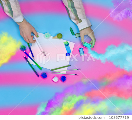 Artists hands with colorful brushes. Artists hands with colorful brushes. 108677719