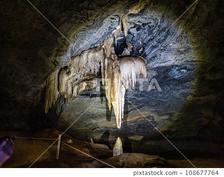 Limestone cave of stalactite and stalagmite formations, Gruta da Lapa Doce Cave, Chapada Diamantina in Bahia, Brazil. Limestone cave of stalactite and stalagmite formations, Gruta da Lapa Doce Cave, Chapada Diamantina in Bahia, Brazil. 108677764