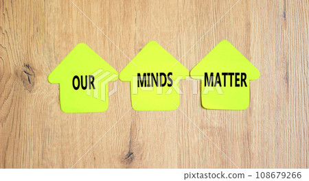 Our minds matter ourmindsmatter symbol. Concept words Our minds matter on beautiful yellow paper house. Beautiful wooden background. Our minds matter ourmindsmatter concept. Copy space. 108679266