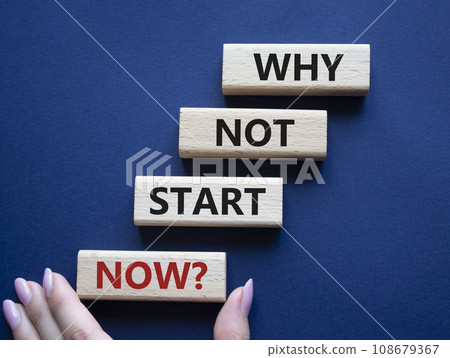 Why not start now symbol. Concept words Why not start now on wooden blocks. Beautiful deep blue background. Businessman hand. Business and Why not start now concept. Copy space. Why not start now symbol. Concept words Why not start now on wooden blocks. Beautiful deep blue background. Businessman hand. Business and Why not start now concept. Copy space. 108679367