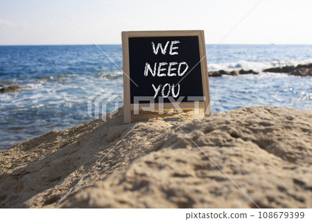 We need you symbol. Concept words We need you on black chalk background blocks. Beautiful sea green background. Business and We need you concept. Copy space. We need you symbol. Concept words We need you on black chalk background blocks. Beautiful sea green background. Business and We need you concept. Copy space. 108679399