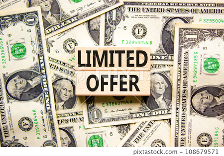 Limited offer symbol. Concept words Limited offer on beautiful wooden block. Beautiful background from dollar bills. Dollar bills. Business marketing, motivational Limited offer concept. Copy space. Limited offer symbol. Concept words Limited offer on beautiful wooden block. Beautiful background from dollar bills. Dollar bills. Business marketing, motivational Limited offer concept. Copy space. 108679571