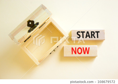 Start now symbol. Concept words Start now on beautiful wooden block. Beautiful white table white background. Empty wooden chest. Business marketing, motivational start now concept. Copy space. Start now symbol. Concept words Start now on beautiful wooden block. Beautiful white table white background. Empty wooden chest. Business marketing, motivational start now concept. Copy space. 108679572