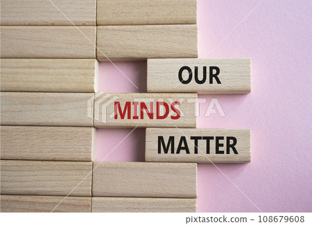 Our Minds Matter symbol. Concept words Our Minds Matter on wooden blocks. Beautiful pink background. Psychological social and Our Minds Matter concept. Copy space. 108679608
