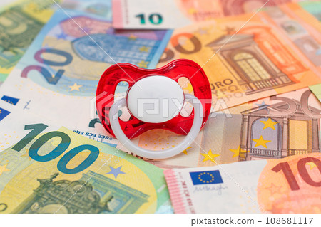Baby Pacifier on the Euro Banknotes Baby Pacifier on the Euro Banknotes 108681117