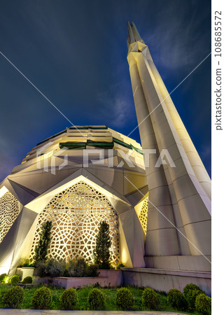 Mosque of Faculty of Theology, radiantly illuminated against the backdrop of serene night sky, Uskudar, Istanbul, Turkey 108685572