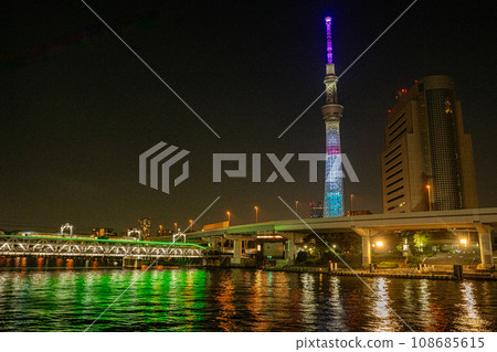 Be healed by the night view of the Sky Tree and Sumida River with Chikawa character writing 108685615
