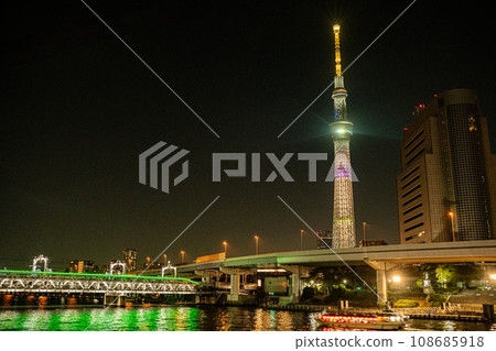 Be healed by the night view of the Sky Tree and Sumida River with Chikawa character writing Be healed by the night view of the Sky Tree and Sumida River with Chikawa character writing 108685918