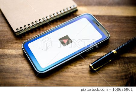 Smartphone on which the video site/app is displayed Smartphone on which the video site/app is displayed 108686961