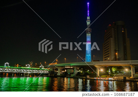 Be healed by the night view of the Sky Tree and Sumida River with Chikawa character writing Be healed by the night view of the Sky Tree and Sumida River with Chikawa character writing 108687187