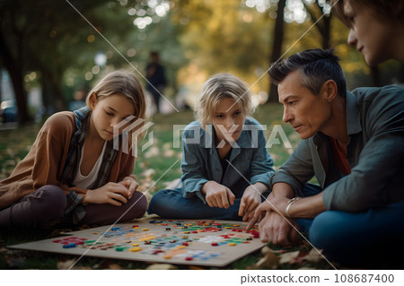 couple working together to care for their children, playing and having fun in a park ai generated 108687400