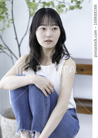 Young lady with tank top 108688166