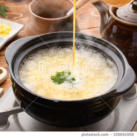Taste of winter - rice porridge - after boiling chicken Taste of winter - rice porridge - after boiling chicken 108692008
