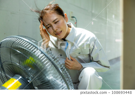 Woman in work clothes hot 108693448