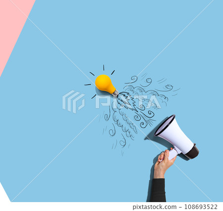 Attention and announcement concept with an idea light bulb flying to the sky like a rocket 108693522