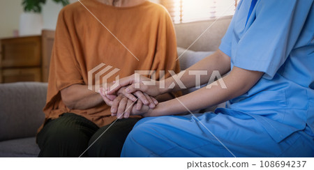 Nurse and doctor with senior patient, empathy and trust for surgery, psychology and healthcare consulting. Closeup psychologist, caregiver and volunteer support, help and hope of mental health 108694237
