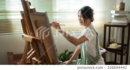 hand of artist with brush painting picture art, creativity, artistic and artwork, painting concept 108694442