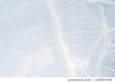 Blank white crumpled and creased paper texture background Blank white crumpled and creased paper texture background 108695496