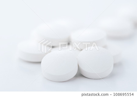 Tablets medicine, pills close-up, pharmacy theme. Tablets medicine, pills close-up, pharmacy theme. 108695554