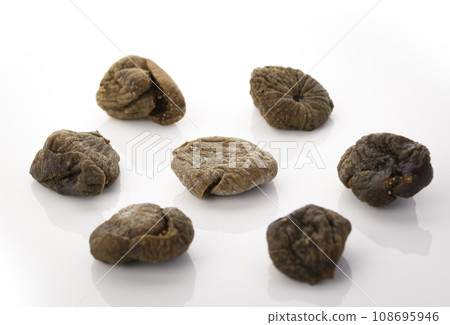 Dried figs white background Dried figs white background 108695946