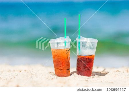 Coffee to go on the beach  108696537