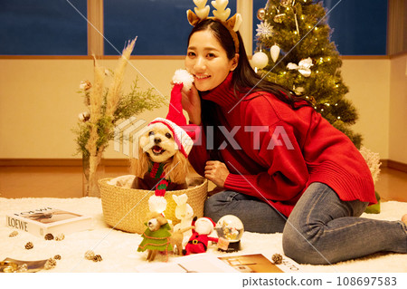 Christmas with a pet dog Christmas with a pet dog 108697583