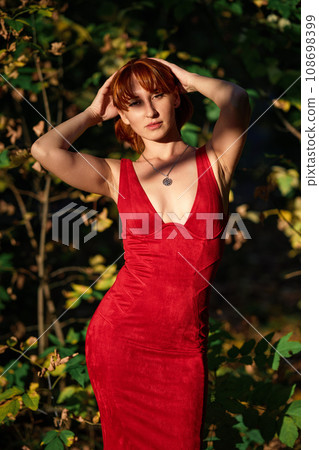 Close-up Portrait of Sensual Redhead Outdoors Close-up Portrait of Sensual Redhead Outdoors 108698399