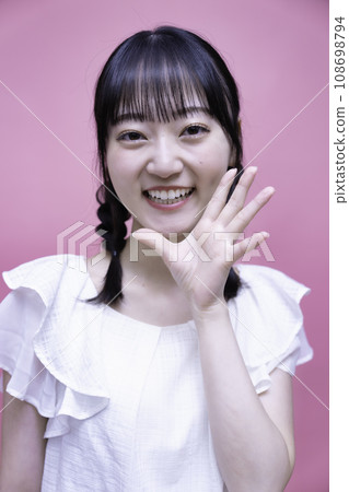 young woman with twin tails 108698794