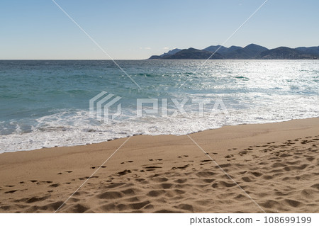 Sand beach of South France during spring with sea waves 108699199