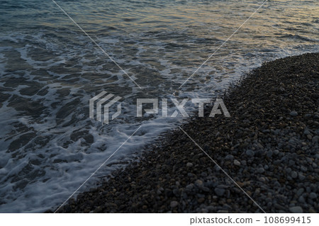 Sunset on the French Riviera pebble beach in Nice Sunset on the French Riviera pebble beach in Nice 108699415