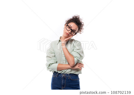 young pretty secretary woman with curly hair dressed in a shirt feels upset young pretty secretary woman with curly hair dressed in a shirt feels upset 108702139
