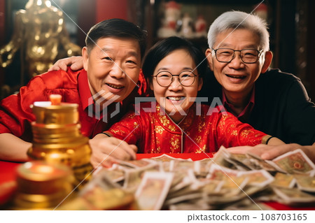 Multi generation family celebrating Chinese New Year Multi generation family celebrating Chinese New Year 108703165