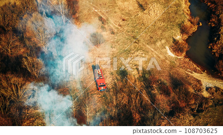 Aerial View. Spring Dry Grass Burns During Drought Hot Weather. 108703625