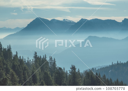 Aerial view of mountains under mist morning Aerial view of mountains under mist morning 108703778
