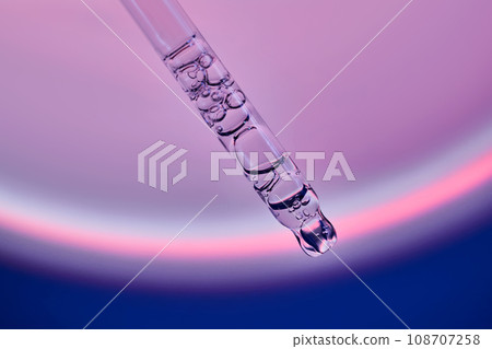 Pipette with serum in a space atmosphere. 108707258