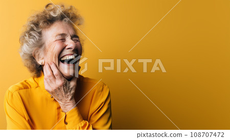 funny elderly woman smiling laughing out loud against blue background funny elderly woman smiling laughing out loud against blue background 108707472